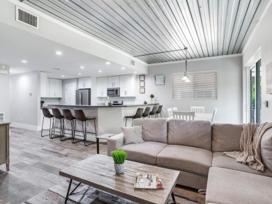 High and Dry! Elevated townhome, no living space on ground level