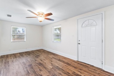 HOME PRICED BELOW APPRAISAL! Charming renovated two bedroom one