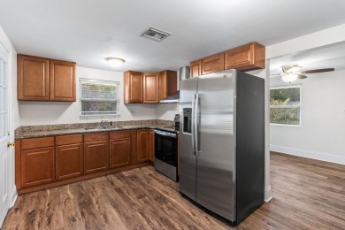 HOME PRICED BELOW APPRAISAL! Charming renovated two bedroom one