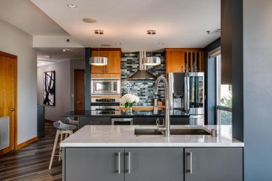 Experience the pinnacle of downtown living just steps from