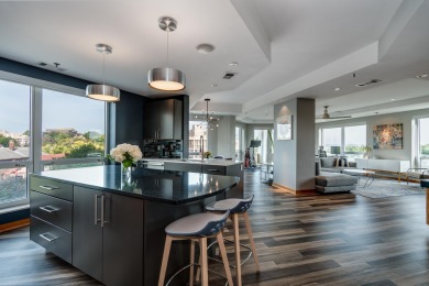 Experience the pinnacle of downtown living just steps from