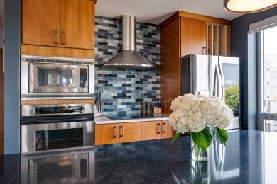 Experience the pinnacle of downtown living just steps from