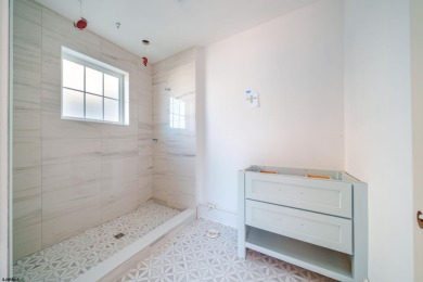 This stunning duplex, located in the desirable Ocean City, NJ