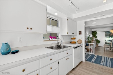 Spectacular panoramic lake views await at this rarely available