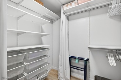 Spectacular panoramic lake views await at this rarely available