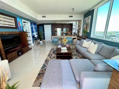 This stunning 2-bed, 2.5-bath penthouse at Strada 315 offers