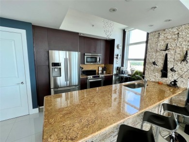 This stunning 2-bed, 2.5-bath penthouse at Strada 315 offers