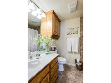 Welcome to this well maintained 3 BR and 2 bath custom built