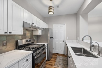 Enjoy low-maintenance lakeside living in this beautifully