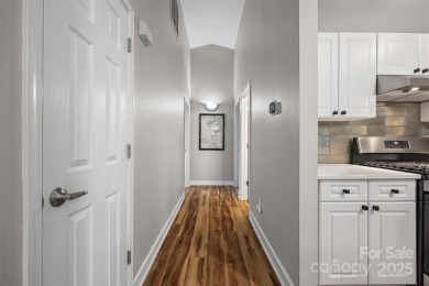 Enjoy low-maintenance lakeside living in this beautifully