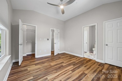 Enjoy low-maintenance lakeside living in this beautifully