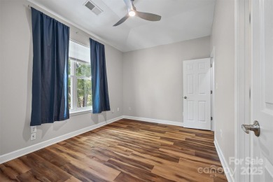 Enjoy low-maintenance lakeside living in this beautifully