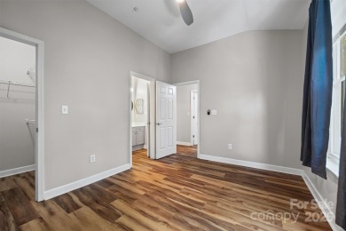 Enjoy low-maintenance lakeside living in this beautifully