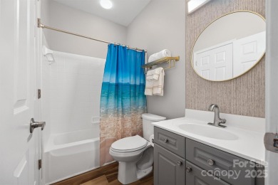 Enjoy low-maintenance lakeside living in this beautifully