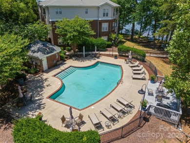 Enjoy low-maintenance lakeside living in this beautifully