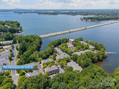 Enjoy low-maintenance lakeside living in this beautifully