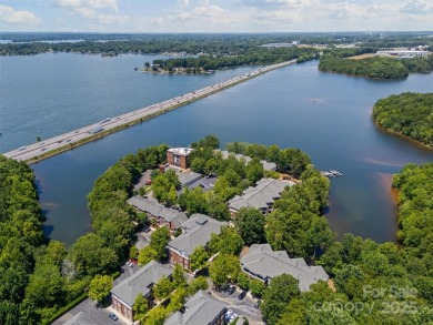 Enjoy low-maintenance lakeside living in this beautifully