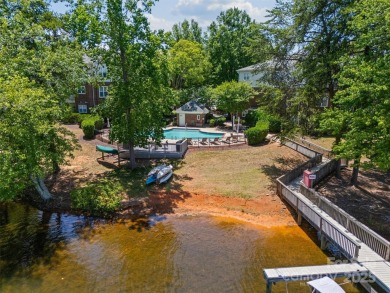 Enjoy low-maintenance lakeside living in this beautifully