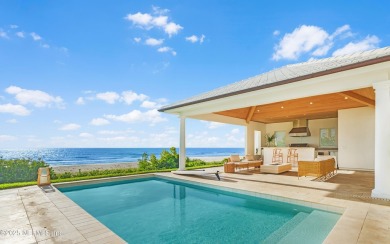 This exquisite, fully furnished, move-in ready luxury oceanfront