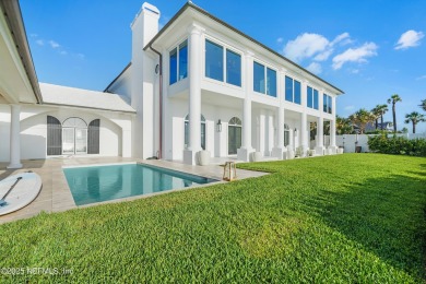 This exquisite, fully furnished, move-in ready luxury oceanfront