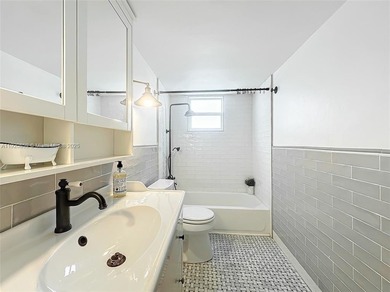 Experience the best of Miami Beach living in this beautiful one