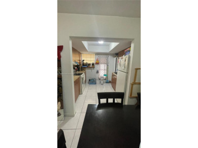 Welcome to Sutton House Condominium in exclusive Sans Souci Blvd