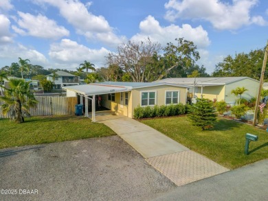 This intracoastal access canal front home presents endless