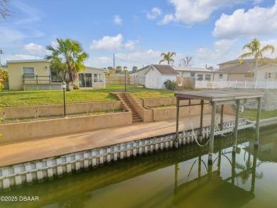 This intracoastal access canal front home presents endless