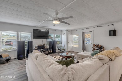 This intracoastal access canal front home presents endless