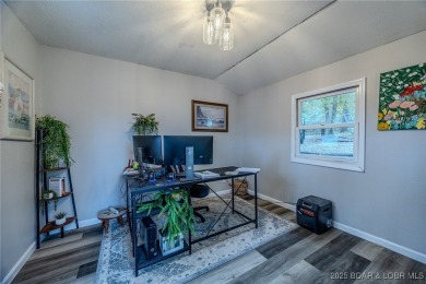 Escape to your own slice of the lake with this 3 bedroom 2 bath