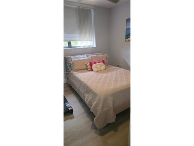 Don't miss out on remodeled 2/2 condo , wood floors throughout