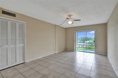 Move-in ready 1/1 top-floor unit with tile floors throughout