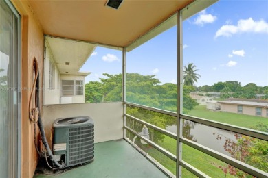 Move-in ready 1/1 top-floor unit with tile floors throughout