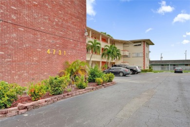 Move-in ready 1/1 top-floor unit with tile floors throughout