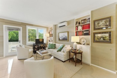 At the very top of the quiet 400 block of Worth Avenue, this one