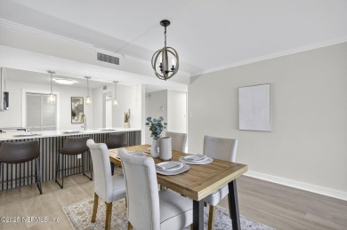 Gated high rise living on the St Johns River! Wake up to