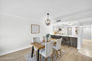 Gated high rise living on the St Johns River! Wake up to