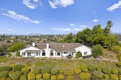 TRANQUIL, RIDGE-TOP CUSTOM-BUILT HOME with unparalleled
