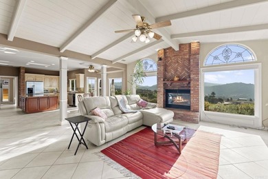 TRANQUIL, RIDGE-TOP CUSTOM-BUILT HOME with unparalleled