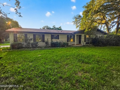 Welcome to this charming 3 bed, 2 bath brick POOL home sitting