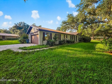 Welcome to this charming 3 bed, 2 bath brick POOL home sitting