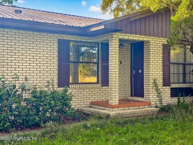 Welcome to this charming 3 bed, 2 bath brick POOL home sitting