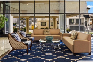 Enjoy spectacular sunrise ocean views from your balcony in this