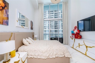 An exquisite 2-bed 2-bath + den residence with breathtaking 16ft