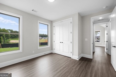 The Berkshire Plan Built by Windsor Bluffs Builder Group. You'll