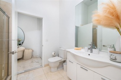 An exquisite 2-bed 2-bath + den residence with breathtaking 16ft