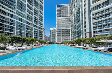 An exquisite 2-bed 2-bath + den residence with breathtaking 16ft