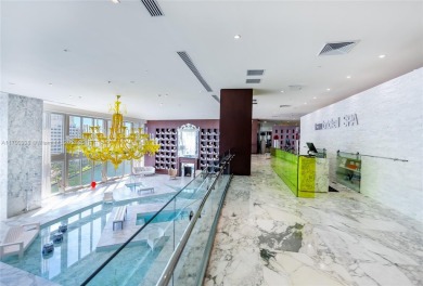 An exquisite 2-bed 2-bath + den residence with breathtaking 16ft