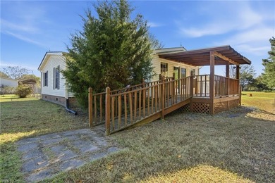 NC Lic # 232478. Enjoy peaceful island living on this spacious 1