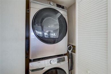 Move-in ready and filled with natural light, this stunning condo